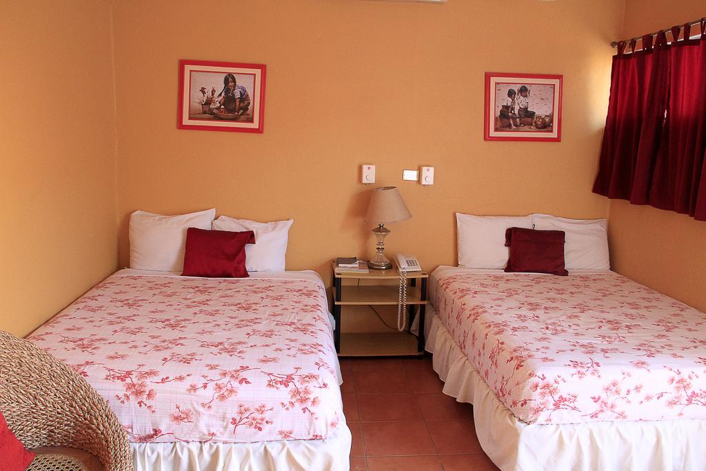 Hotel Y Apartments Los Cisneros Managua Room photo